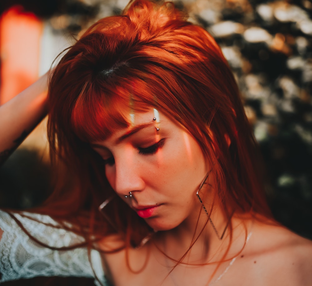 Woman with eyebrow piercing