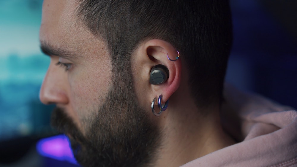 Man with multiple lobe piercings