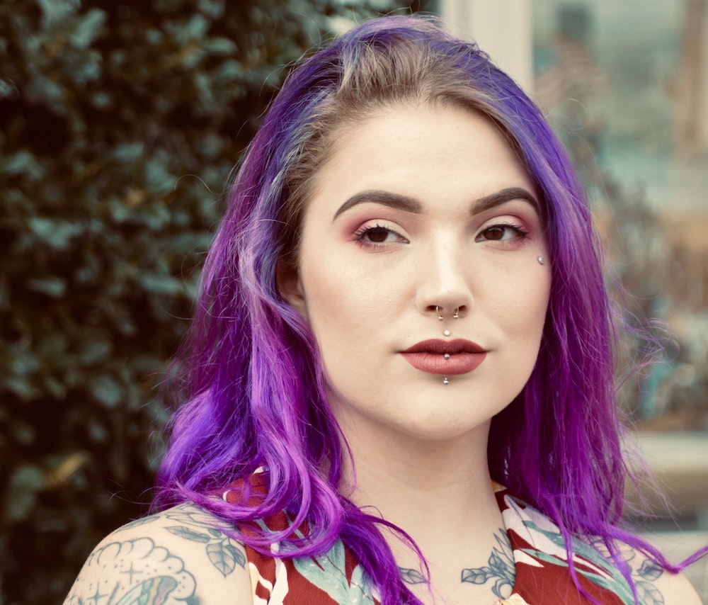 woman with a vertical labret piercing